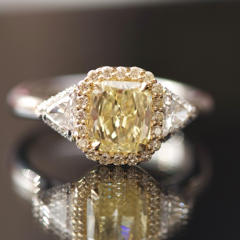 Fancy Yellow 2 carats diamond and white diamonds white gold ring