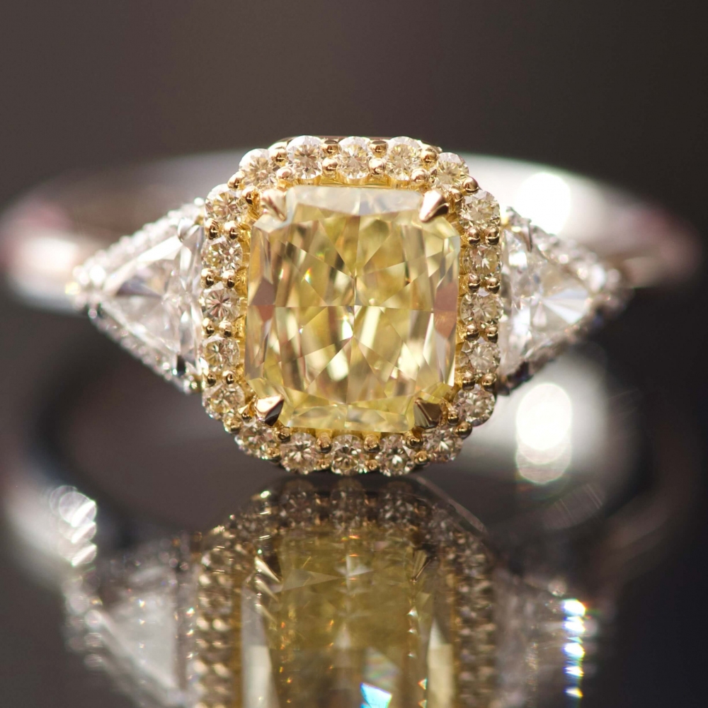 Fancy Yellow 2 carats diamond and white diamonds white gold ring